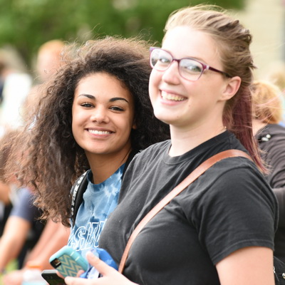 two smiling students